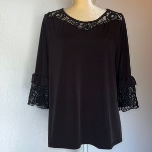 Women’s three-quarter length blouse with lace accents